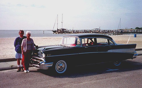 John and Kay Lynn Dragoo pose with their 1957 4-door Bel Air sedan